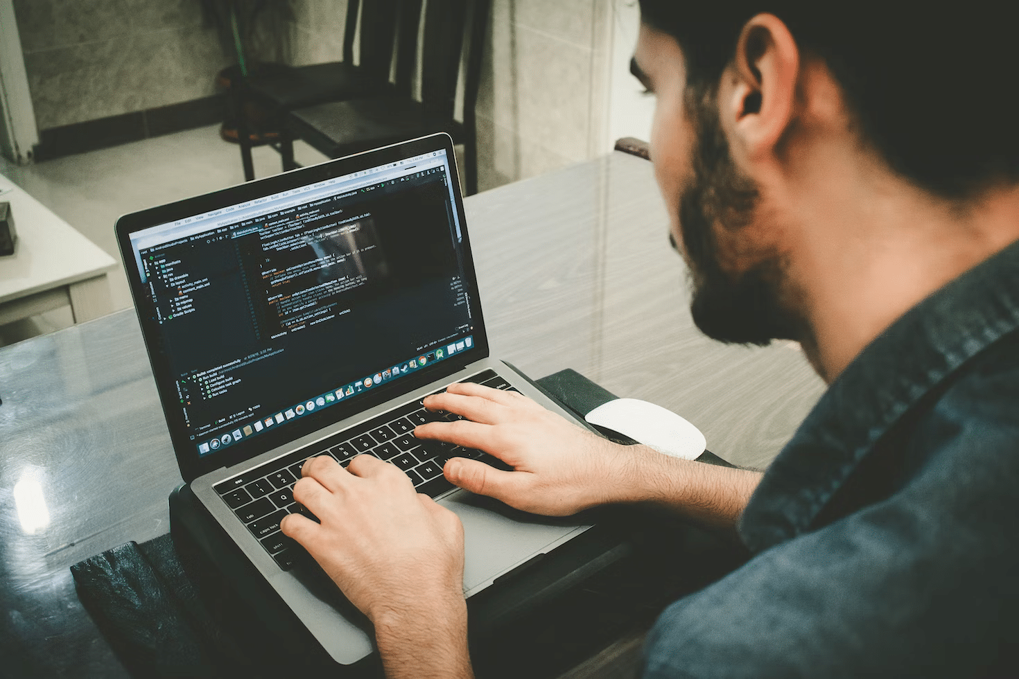 a man using a laptop